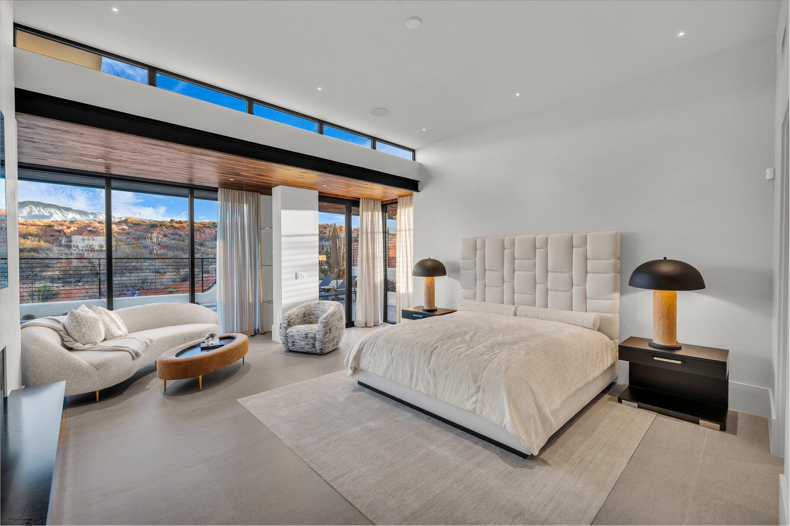 master bedroom with couch and bed