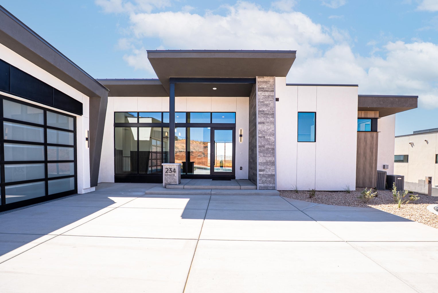 front of house with modern garage