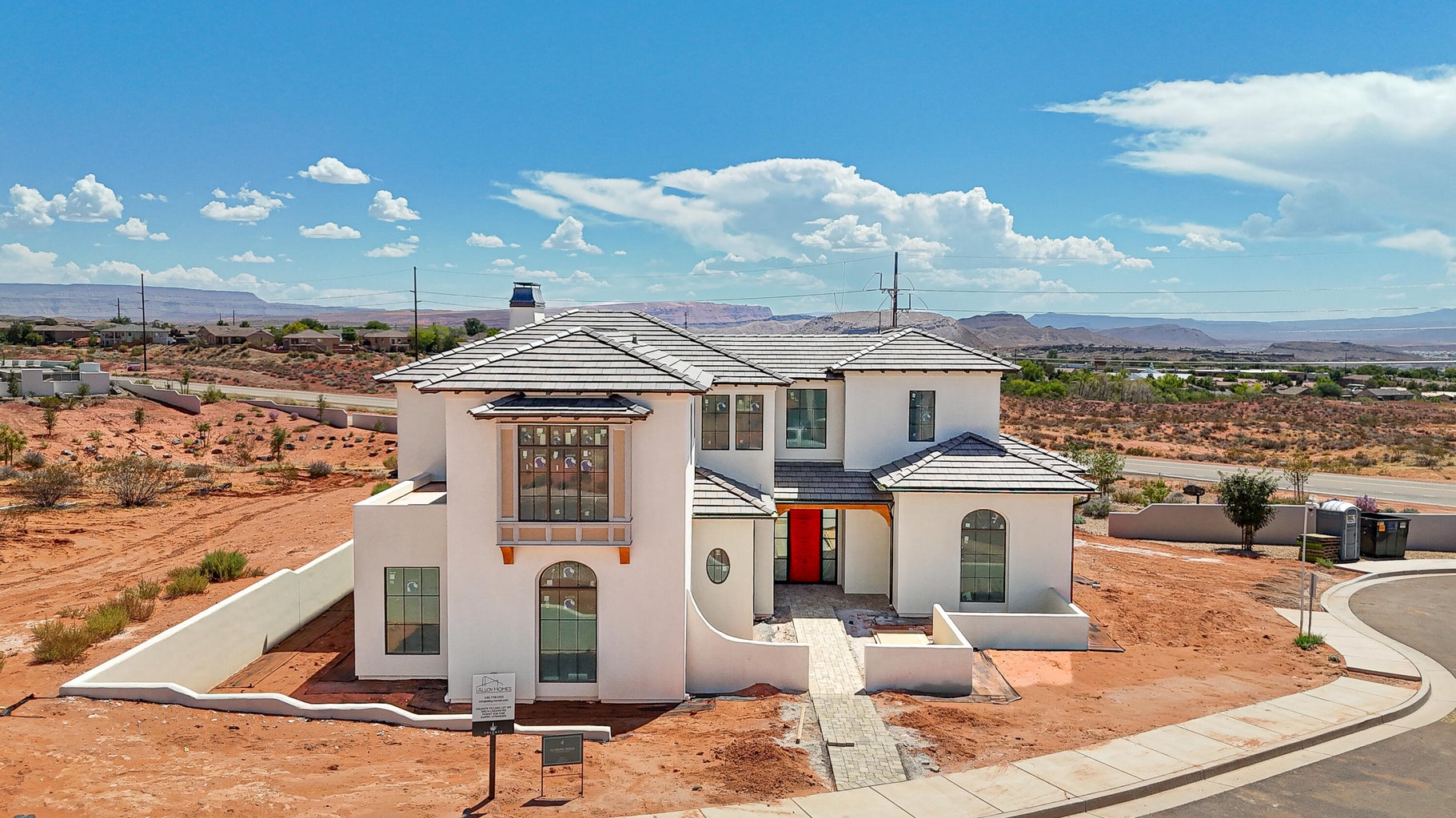 front of white desert home