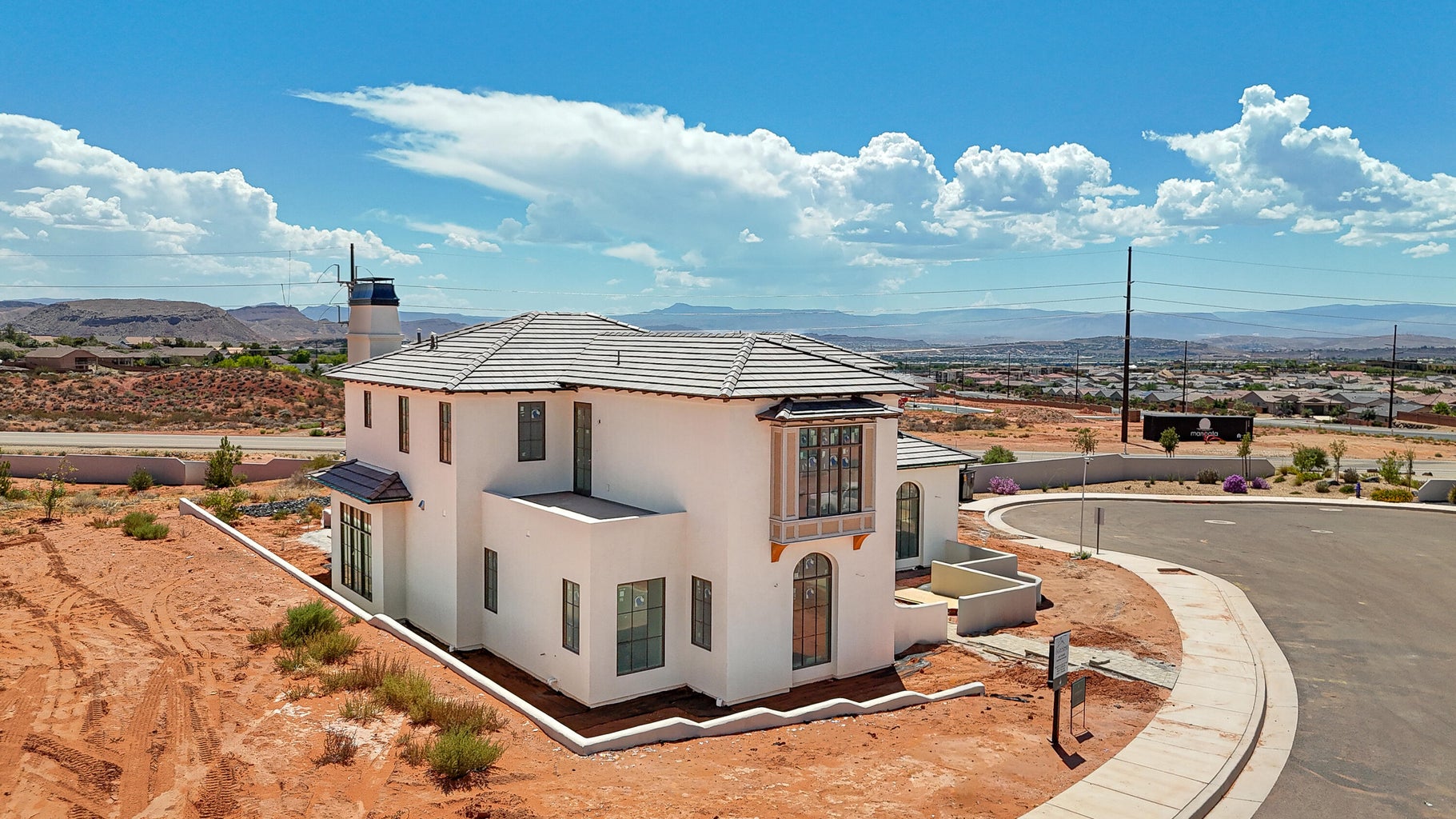 side of white desert home